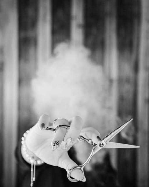 Barber tools held through smoke